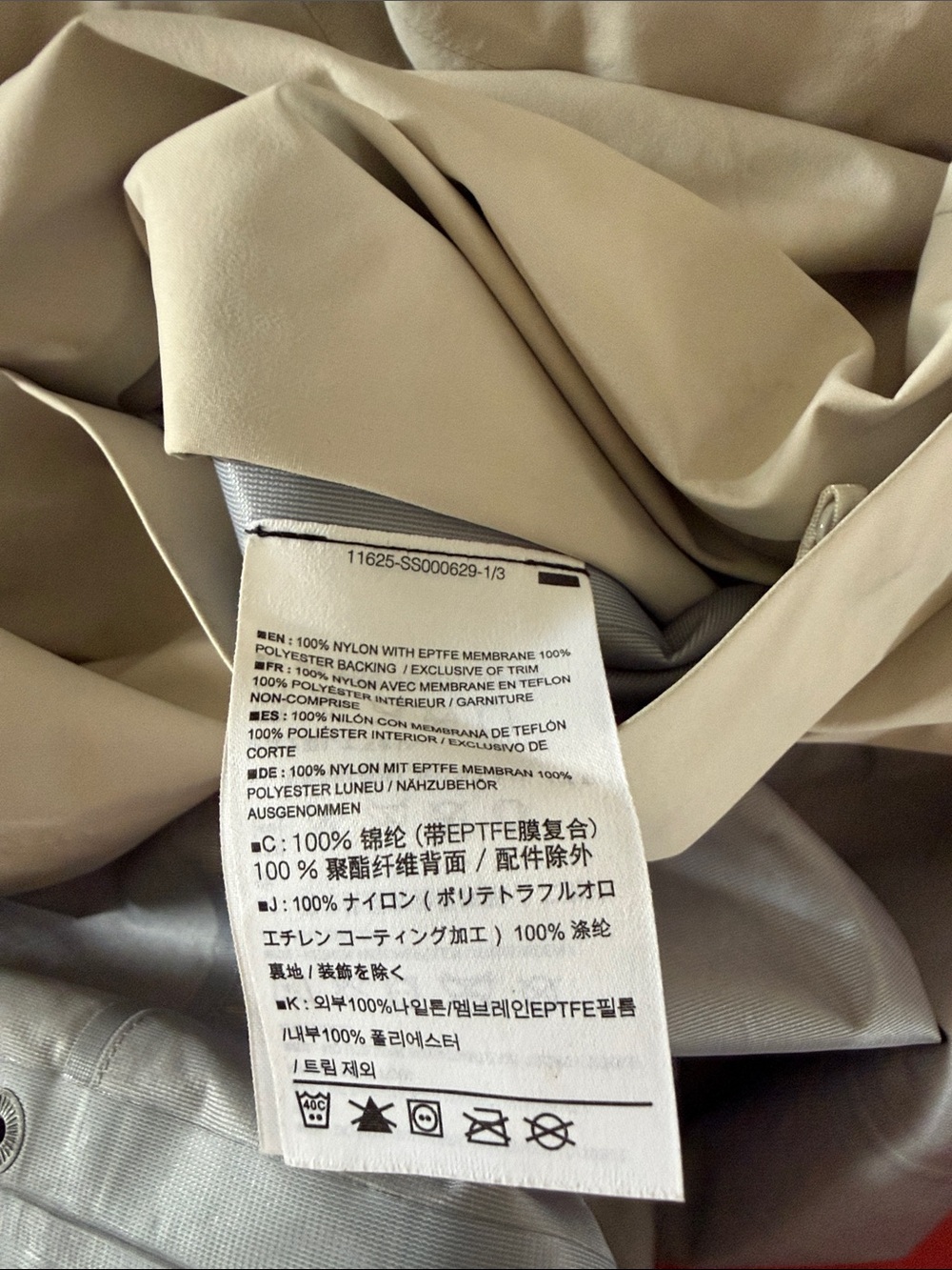 Arc'teryx Women's Hooded Raincoat in Light Beige - Picture 11 of 11